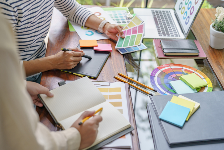 Image of a person using a tablet computer to design a sensory room